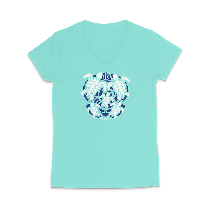 Mint green t-shirt with a blue and white turtle design on a white background