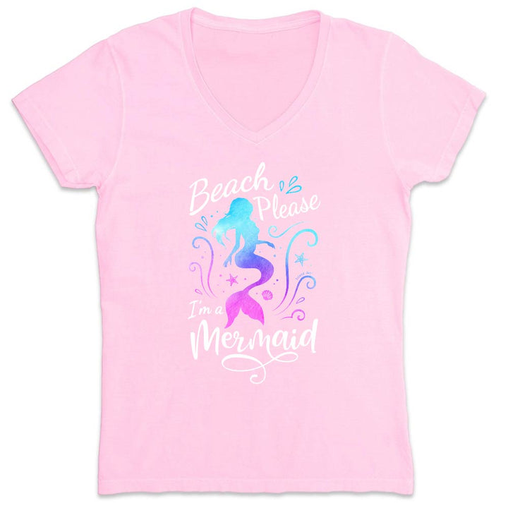 Pink t-shirt with mermaid design and text on a white background