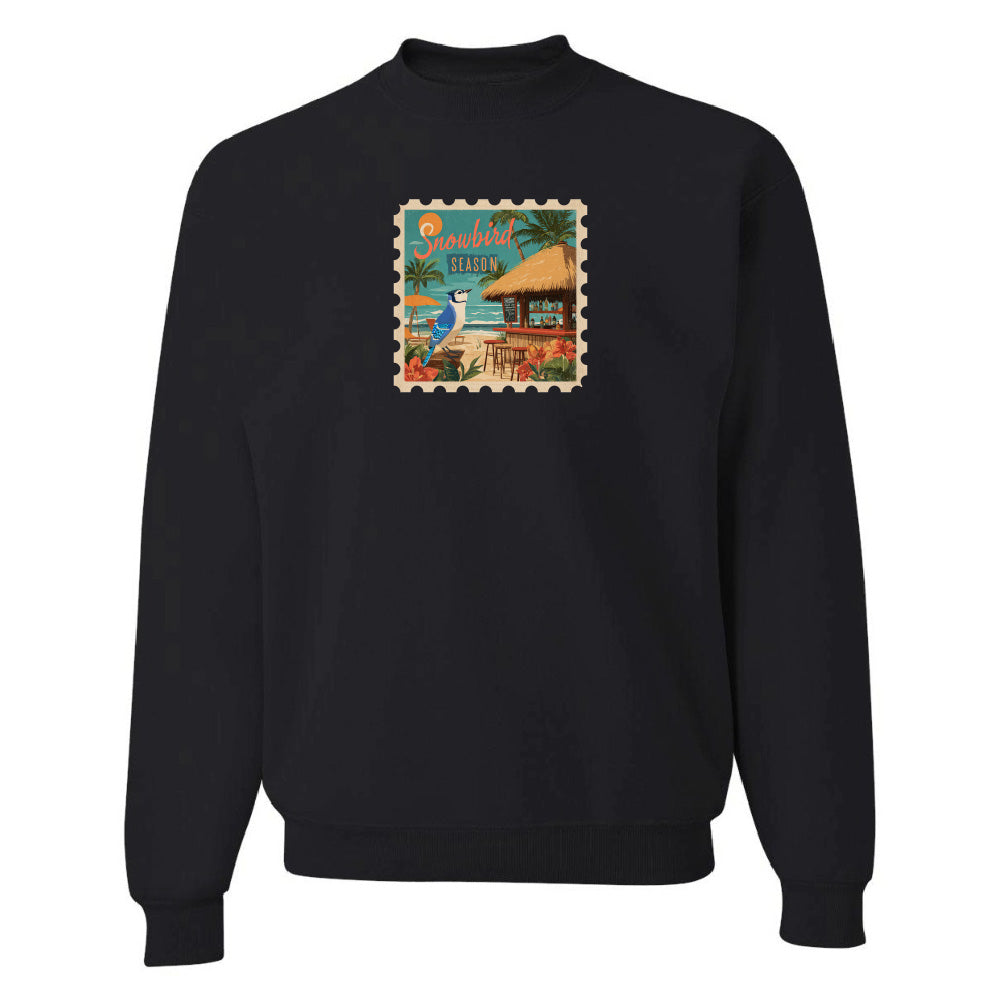 Black sweatshirt with a colorful graphic on a white background