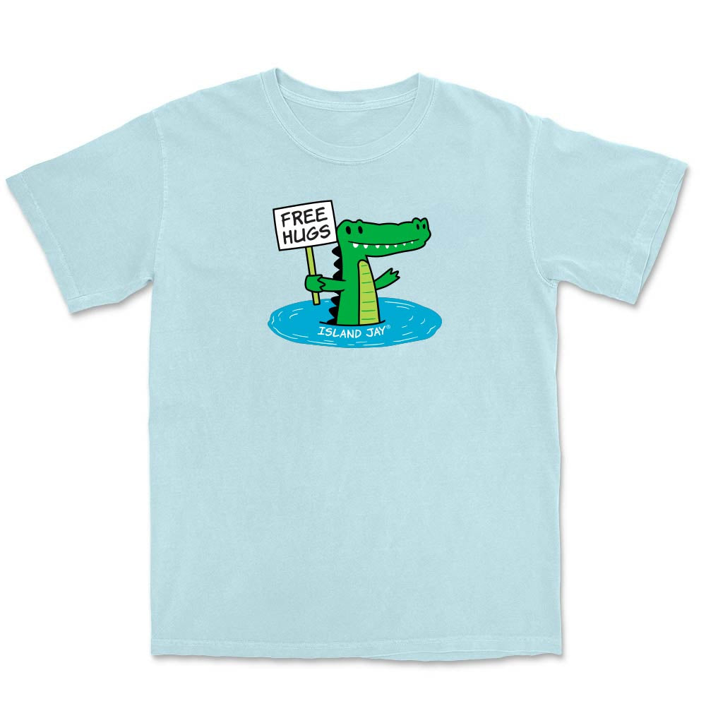 Light blue T-shirt with alligator graphic and text reading "free hugs".