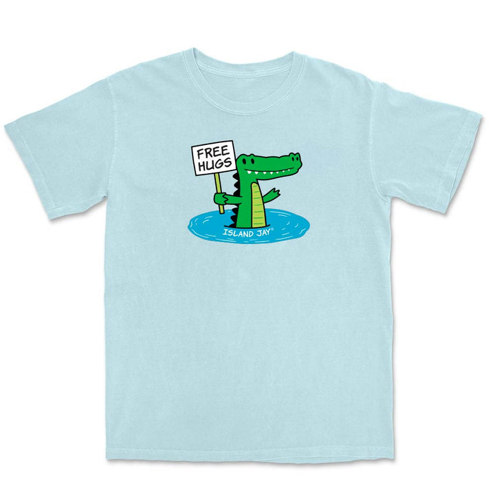 Light blue T-shirt with alligator graphic and text reading "free hugs".