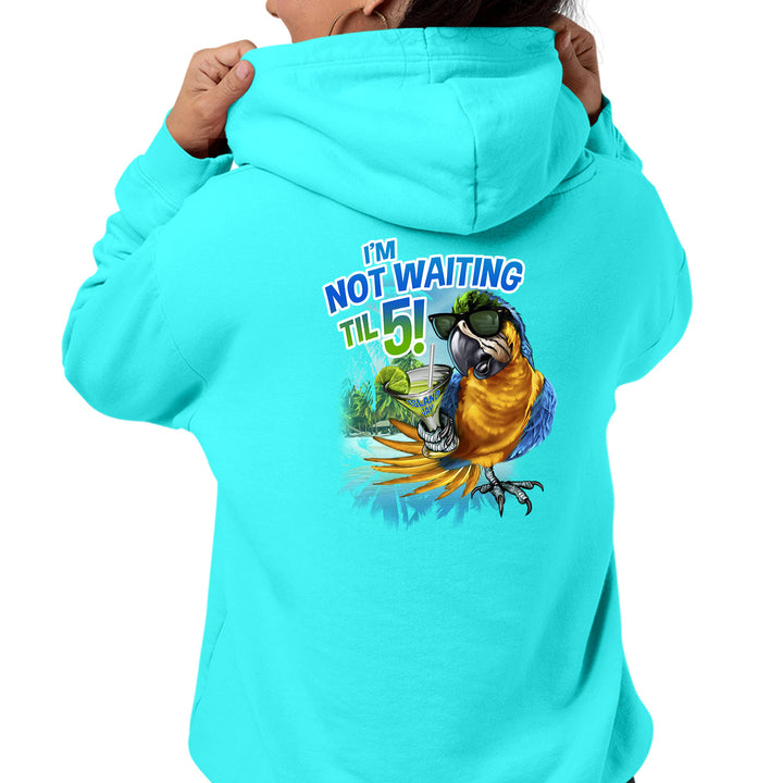 Women wearing a I'm Not Waiting Til 5 Parrot Soft Style Pullover Hoodie. Scuba blue color complements a tropical parrot wearing sunglasses and holding a drink