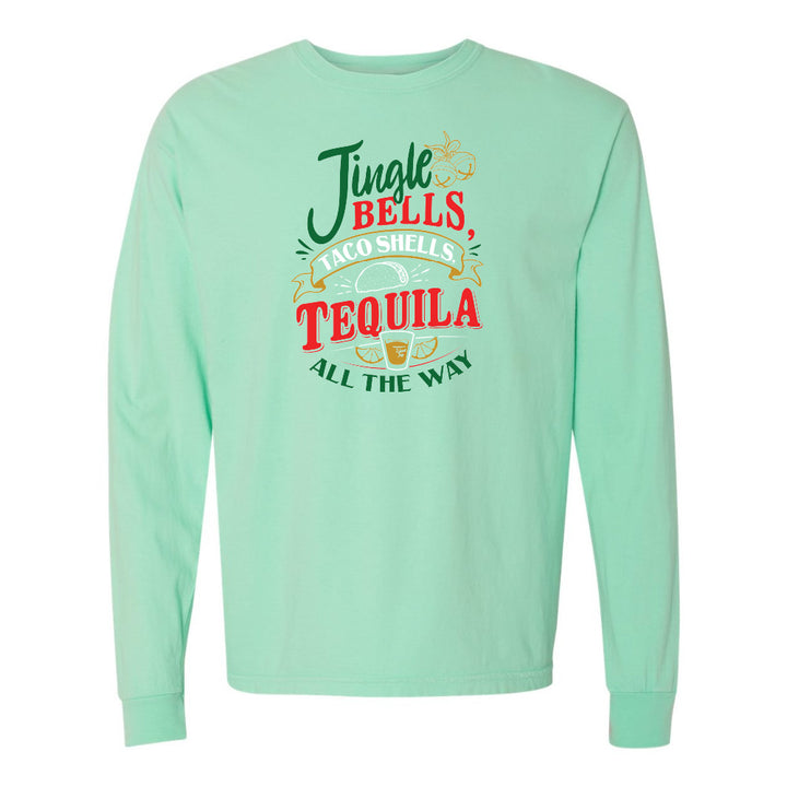 Mint green long-sleeve shirt with festive text design on a white background