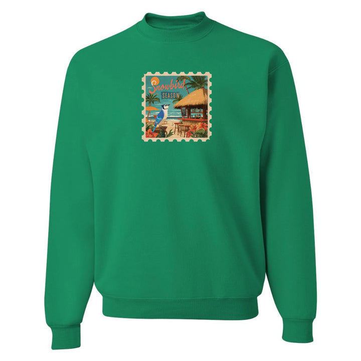 Green sweatshirt with a graphic design on a white background