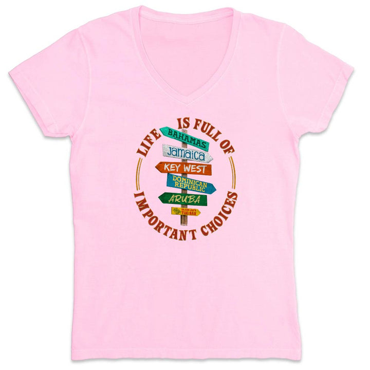 Pink t-shirt with travel-themed design and text on a white background