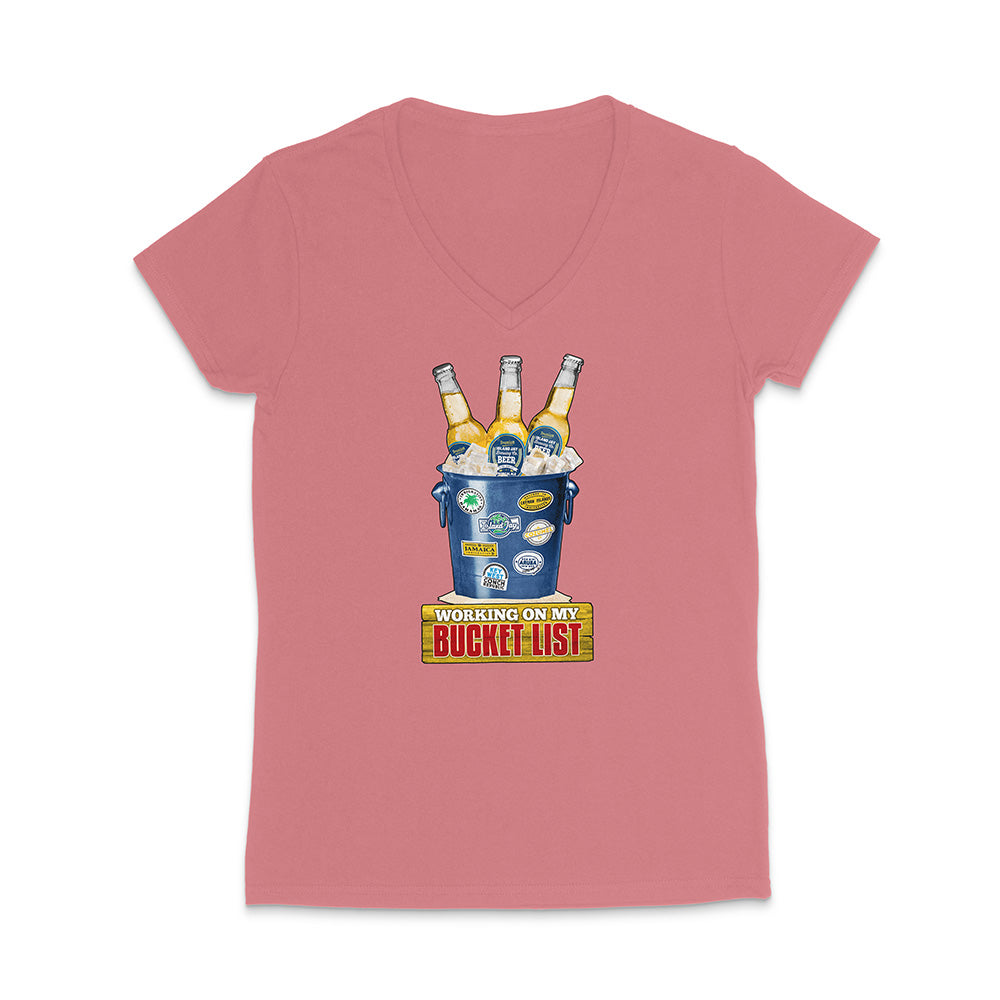 Pink t-shirt with a graphic of a beer bucket with graphic text reading 'Working on my Bucket List' on a white background.