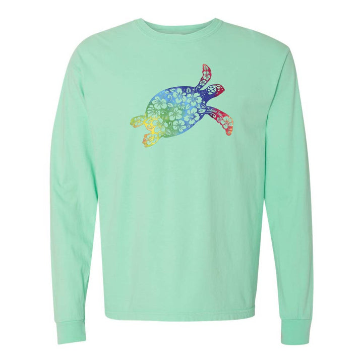 Mint green long sleeve with a colorful turtle design graphic.