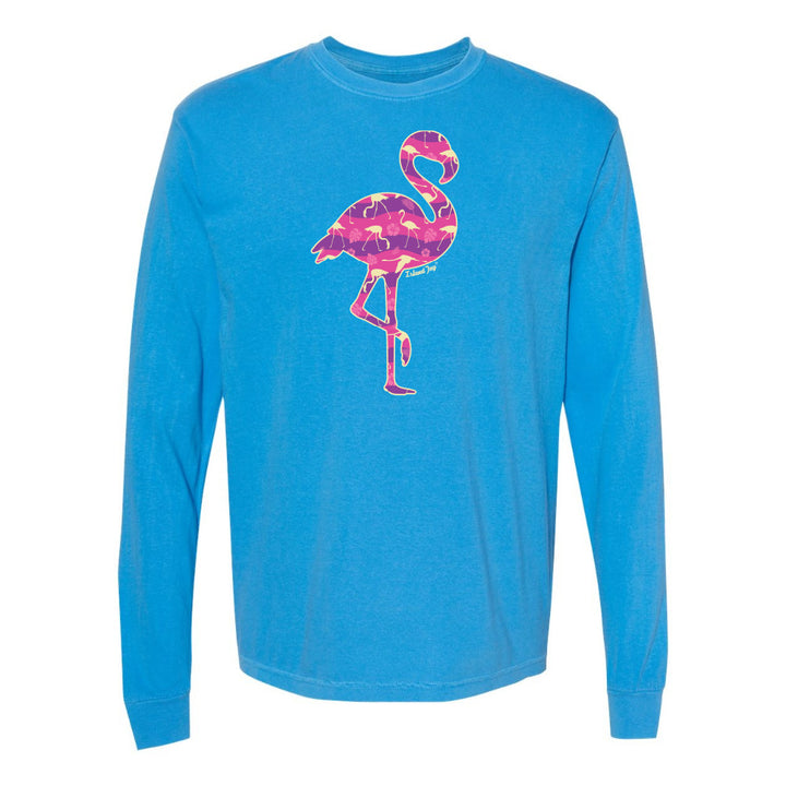 Blue long-sleeve shirt with a pink flamingo design on a white background