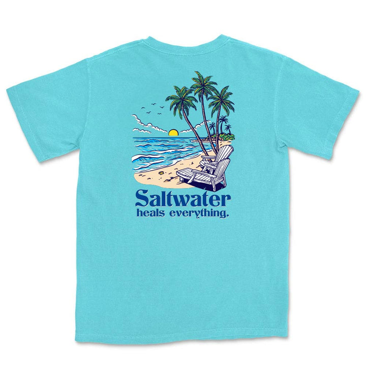 Light blue t-shirt with a beach graphic and 'Saltwater heals everything' text.