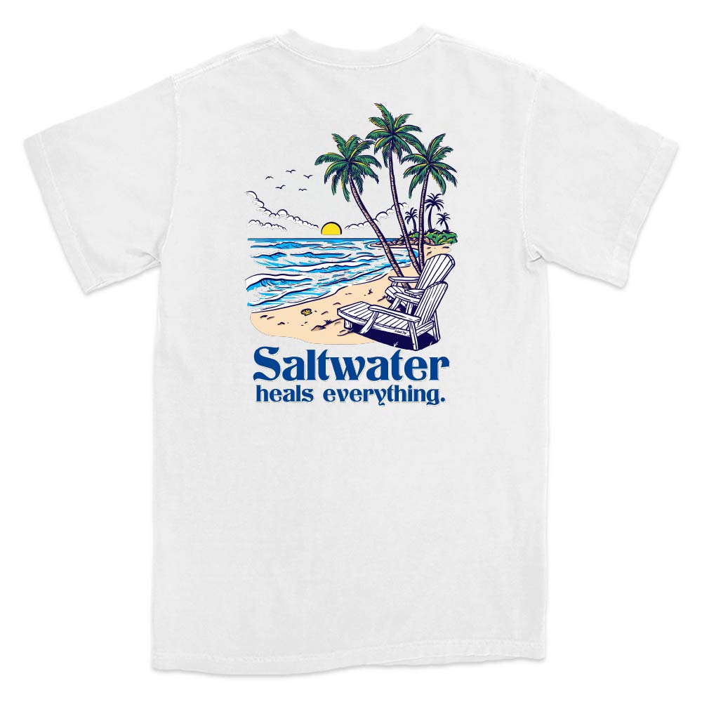 White t-shirt with a beach graphic and 'Saltwater heals everything' text.