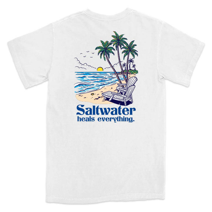 White t-shirt with a beach graphic and 'Saltwater heals everything' text.