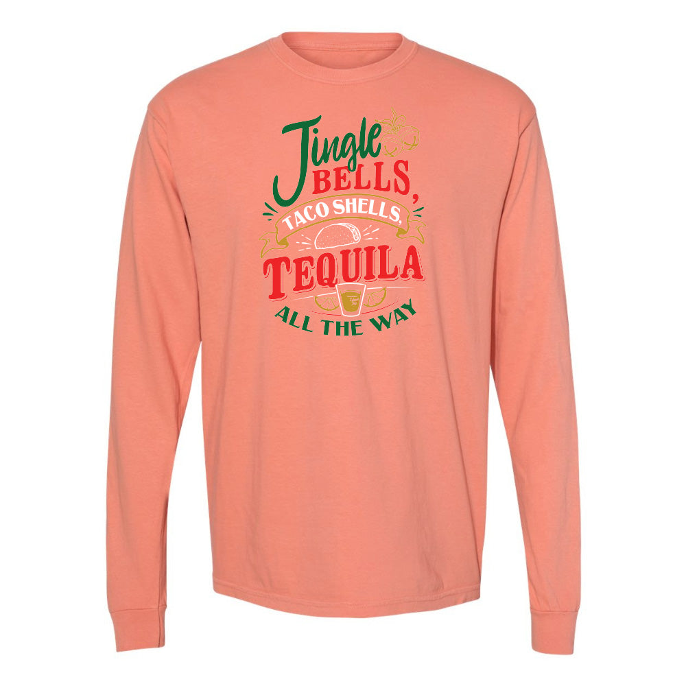 Peach long-sleeve shirt with festive text design on a white background