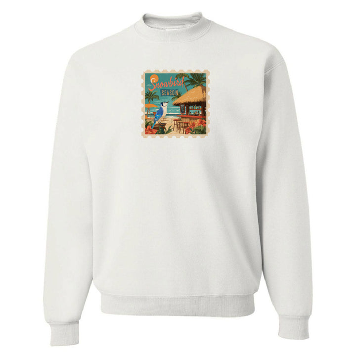 White sweatshirt with a colorful graphic on the chest against a white background