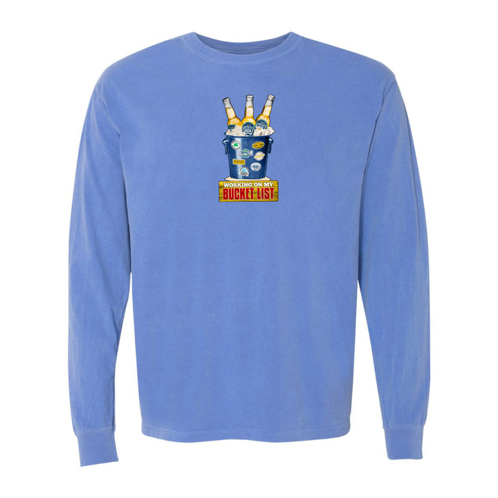 Blue long-sleeve shirt with a graphic design on a white background
