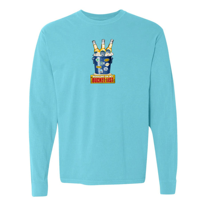 Light blue long-sleeve shirt with a graphic design on a white background