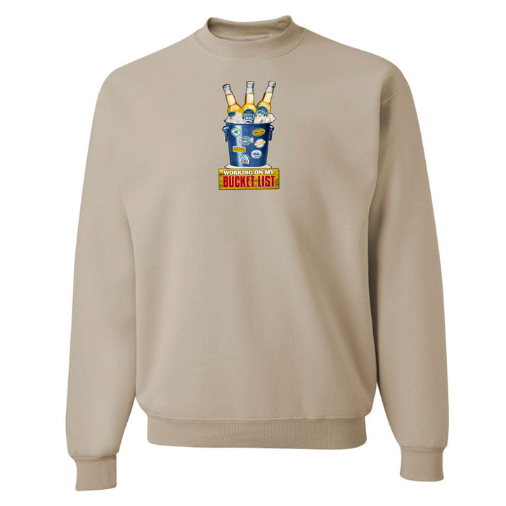 Beige sweatshirt with a graphic design on the chest against a white background