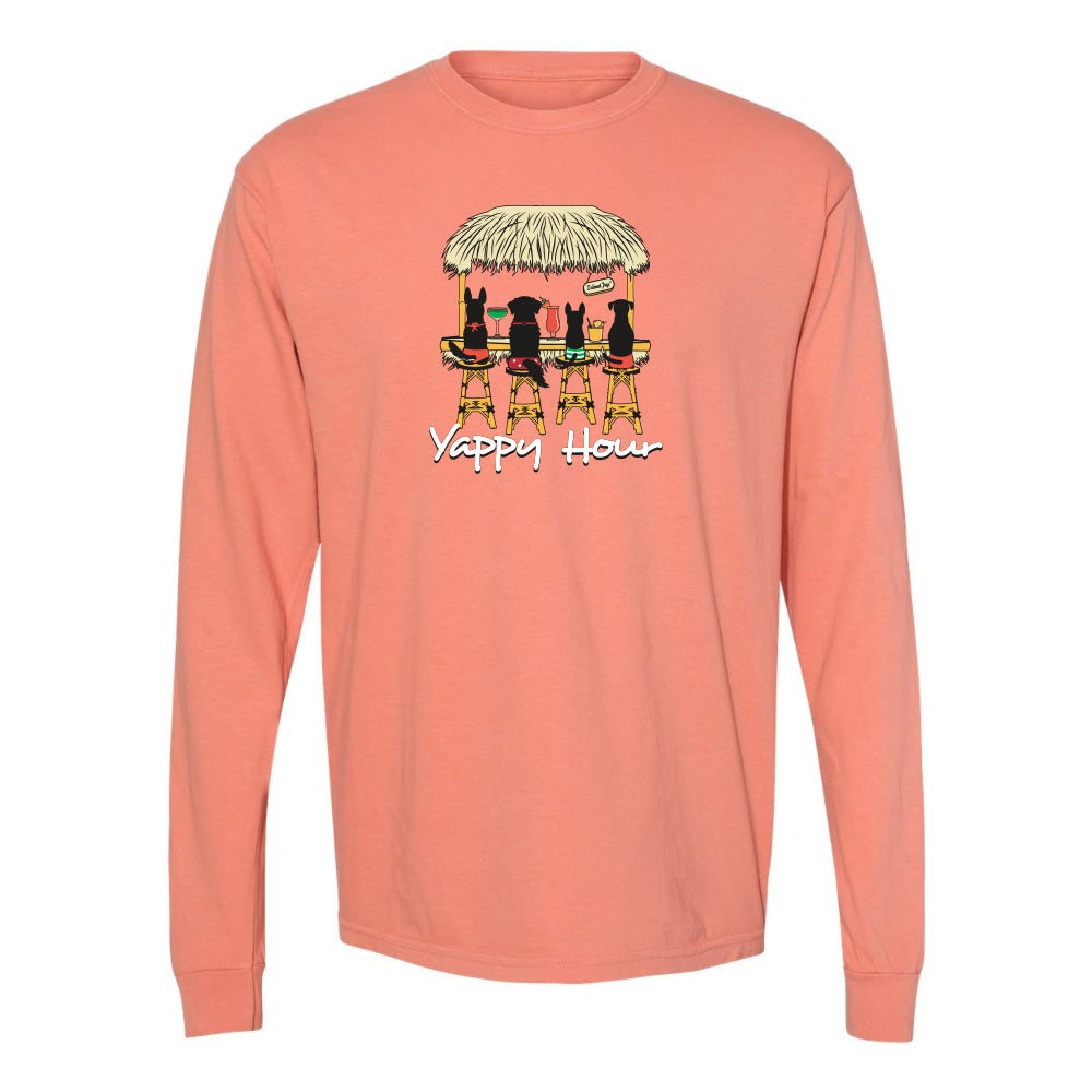 Coral long-sleeve shirt with a graphic of three dogs under an umbrella and 'Yappy Hour' text on a white background.
