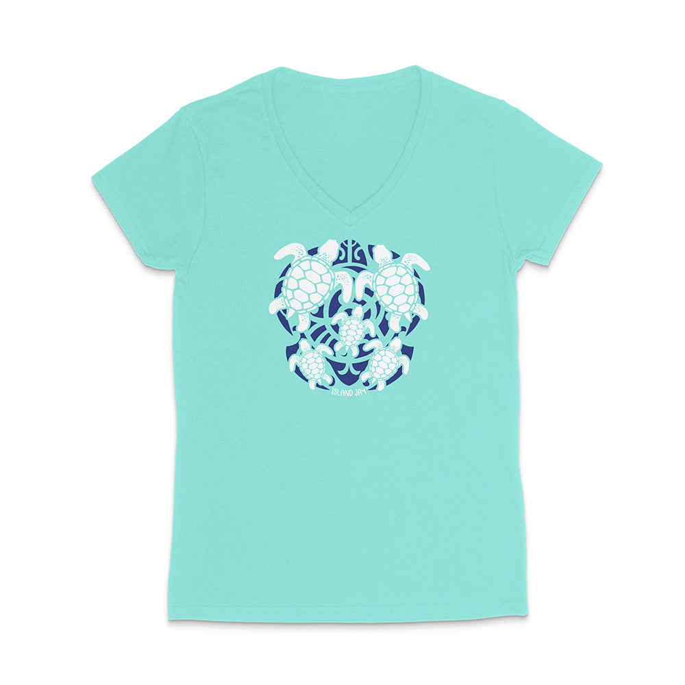 Mint green t-shirt with a blue and white turtle design on a white background