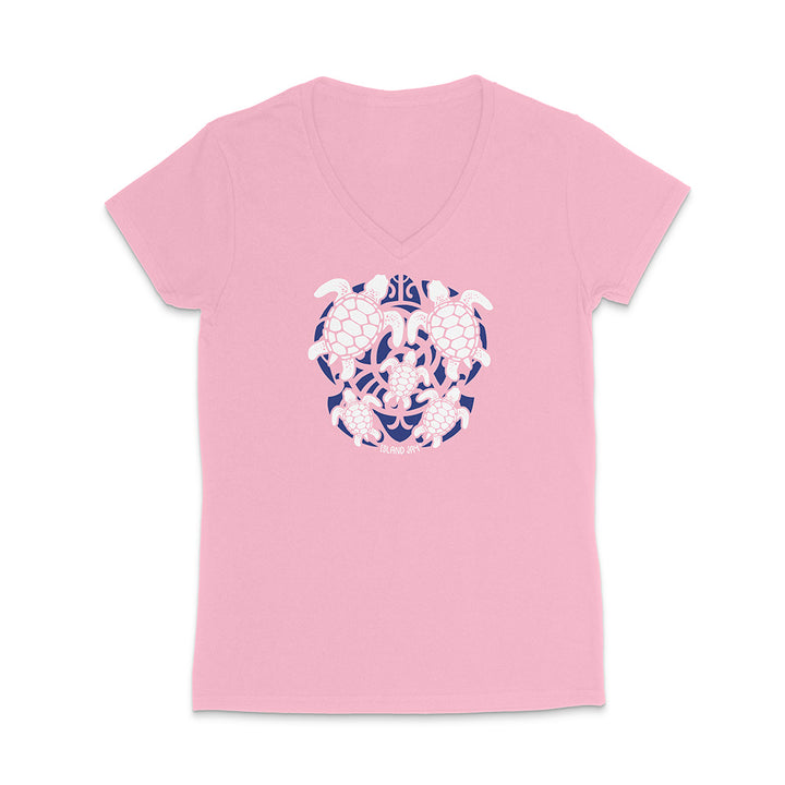 Pink t-shirt with a floral turtle design on a white background