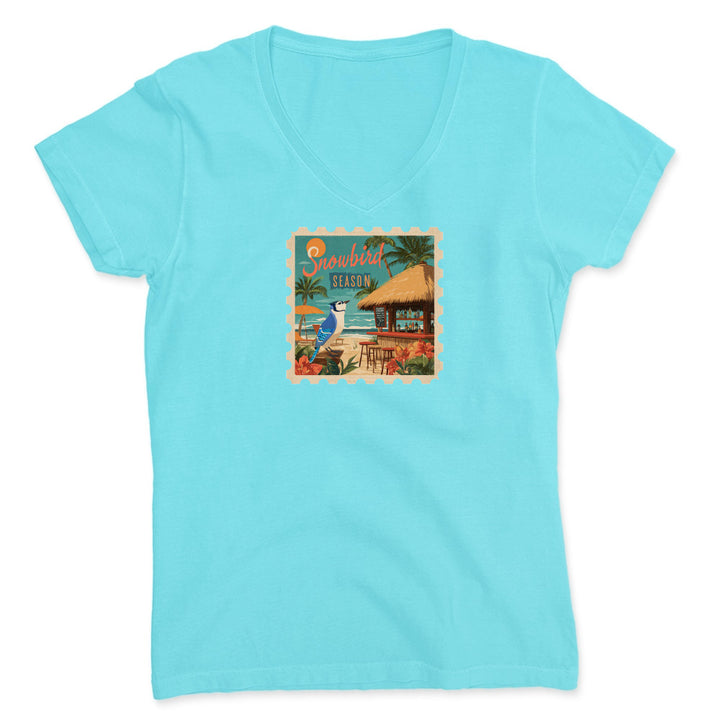 Light blue t-shirt with a tropical graphic on a white background