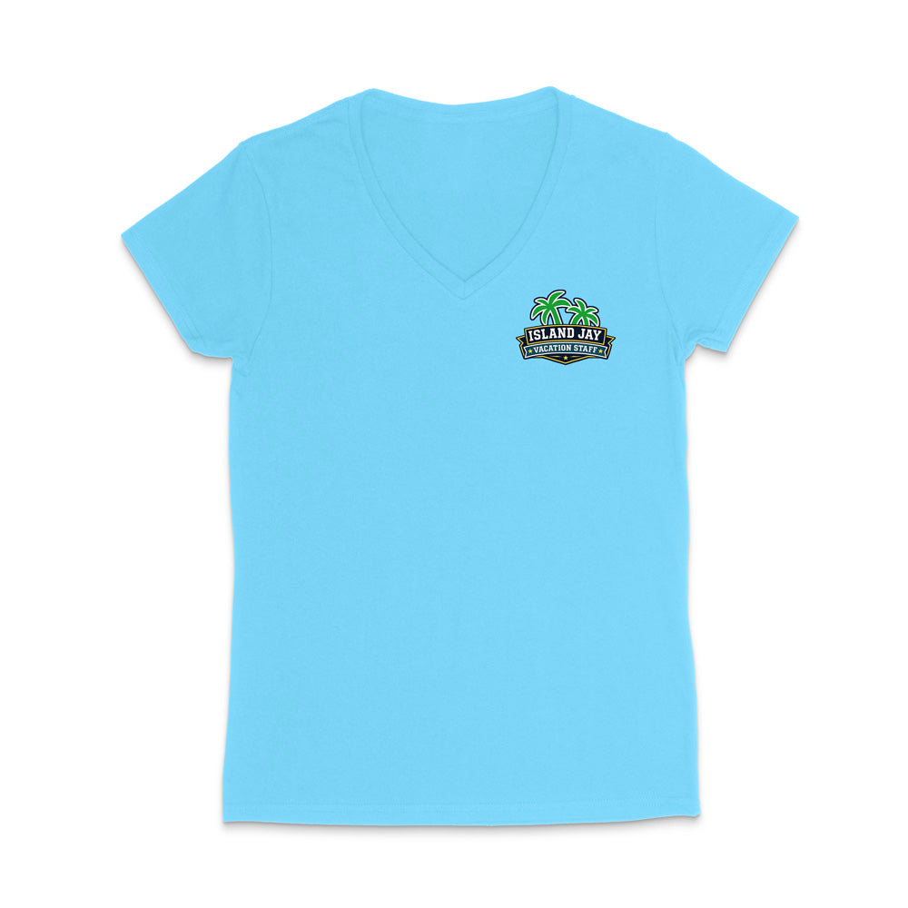A light blue women's short-sleeve V-neck t-shirt with a small colorful graphic on the left chest featuring palm trees and the text 'Island Jay Vacation Staff'.