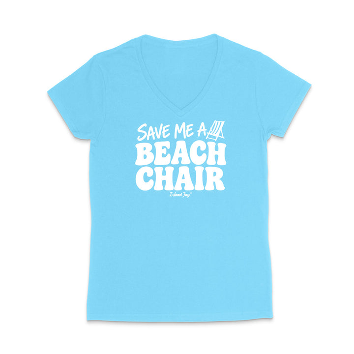 A light blue women's V-neck t-shirt with a white graphic print on the front that reads 'SAVE ME A BEACH CHAIR' 