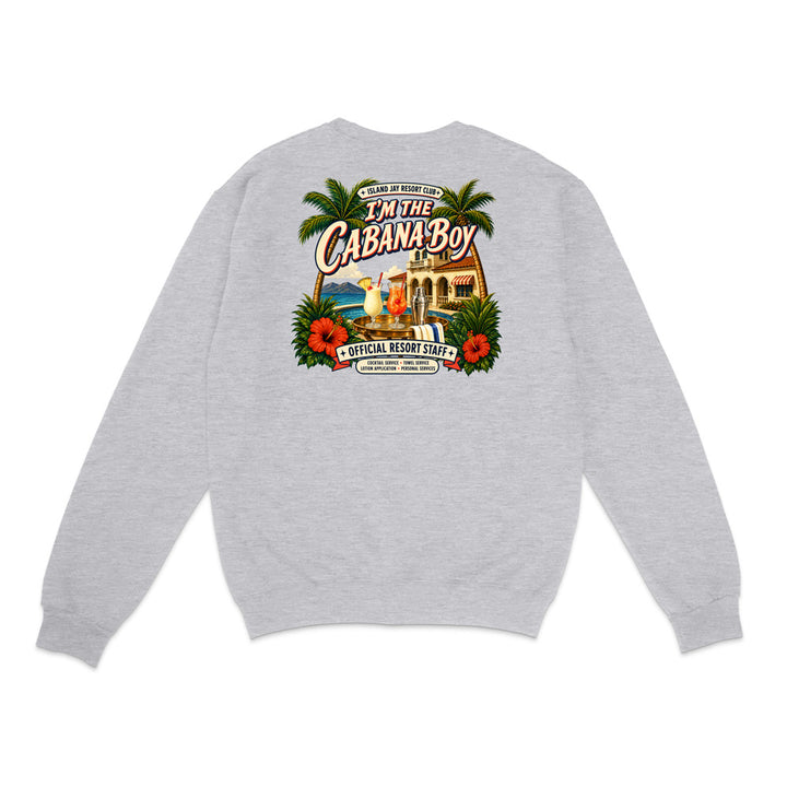 A light heather gray crewneck sweatshirt shown from the back, featuring a large, colorful graphic print of a tropical cabana resort with palm trees, red hibiscus flowers, and the text 'I'M THE CABANA BOY'.