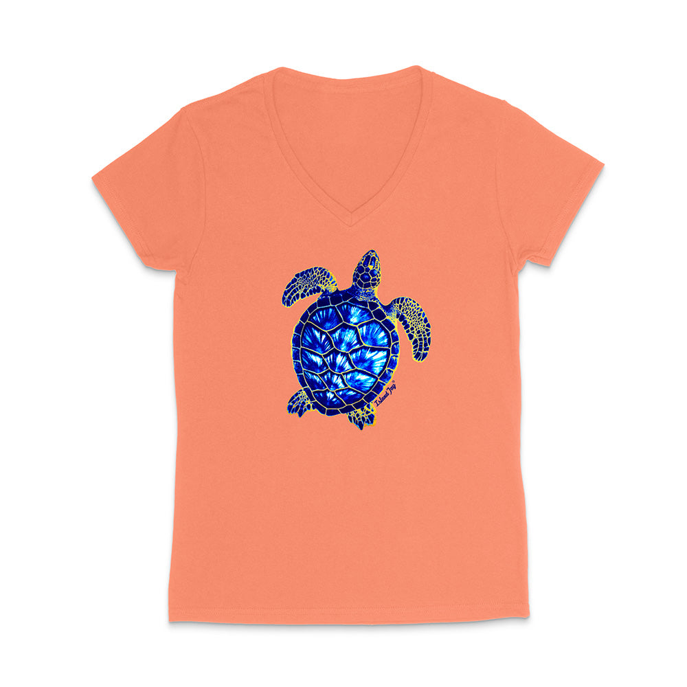 Coral t-shirt with a blue turtle design on a white background
