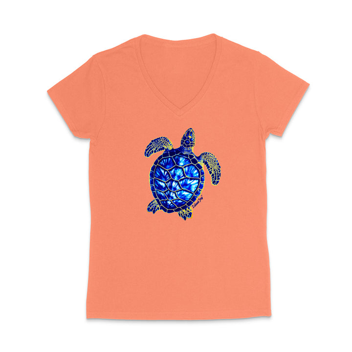 Coral t-shirt with a blue turtle design on a white background