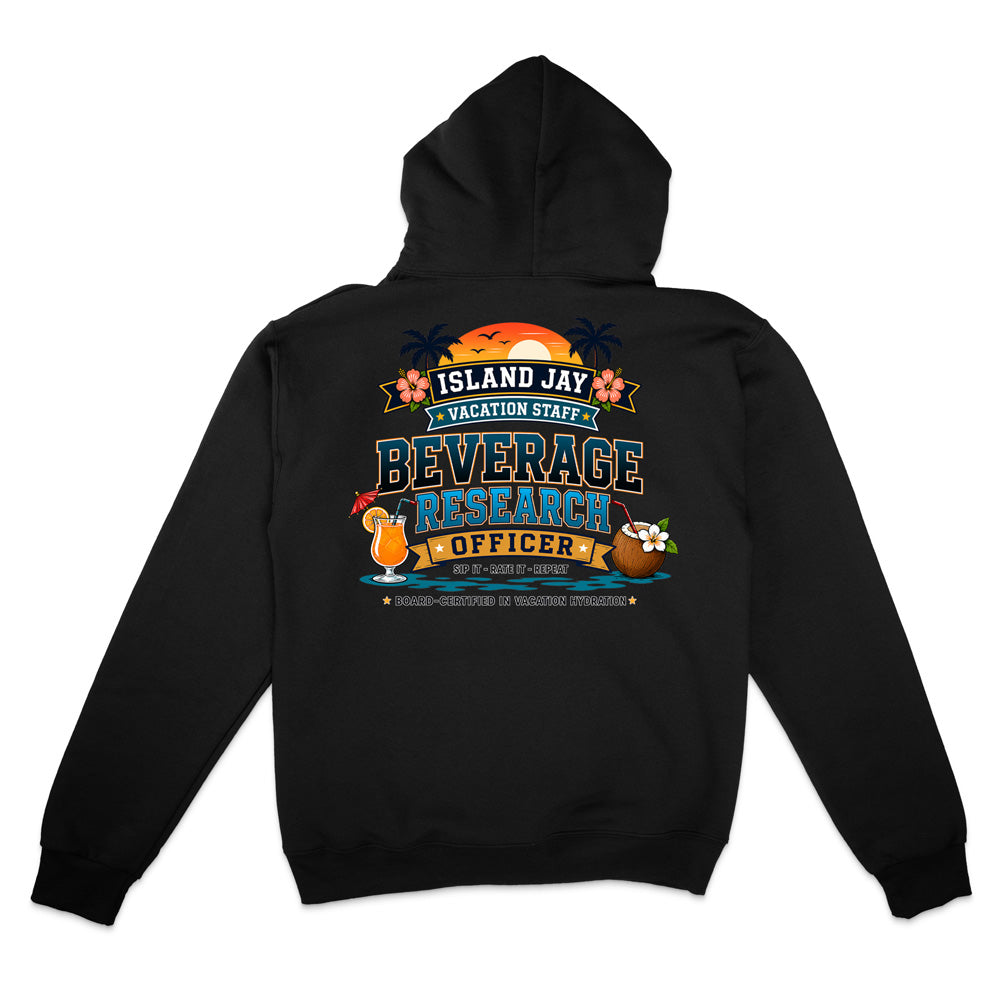 A black pullover hoodie shown from the back, featuring a colorful graphic print with tropical-themed text reading 'ISLAND JAY VACATION STAFF BEVERAGE RESEARCHER OFFICER' and cartoon drink illustrations.