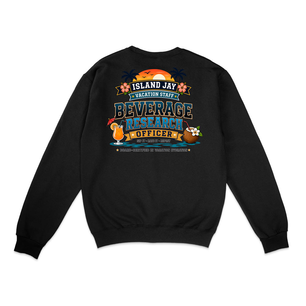A black crewneck sweatshirt shown from the back, featuring a colorful graphic print with a sunset, tropical flowers, a cocktail, and the text 'ISLAND JAY VACATION STAFF BEVERAGE RESEARCH OFFICER'.