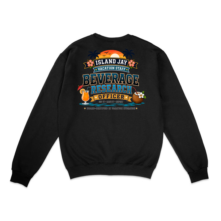 A black crewneck sweatshirt shown from the back, featuring a colorful graphic print with a sunset, tropical flowers, a cocktail, and the text 'ISLAND JAY VACATION STAFF BEVERAGE RESEARCH OFFICER'.