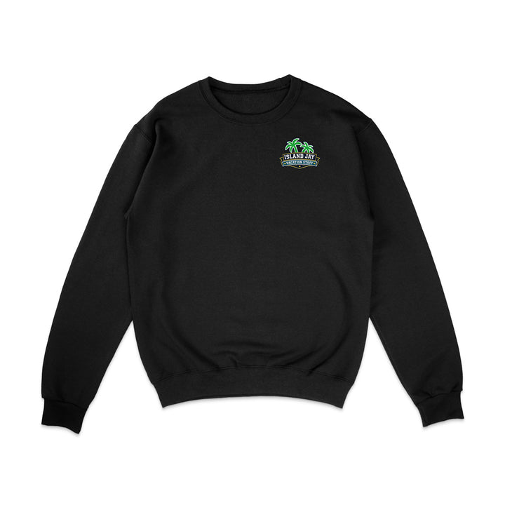 A black crewneck sweatshirt with a small green and blue graphic on the left chest featuring palm trees and the text 'THE DAY THE WORLD COLLAPSED'. The sweatshirt is displayed flat against a solid white background.