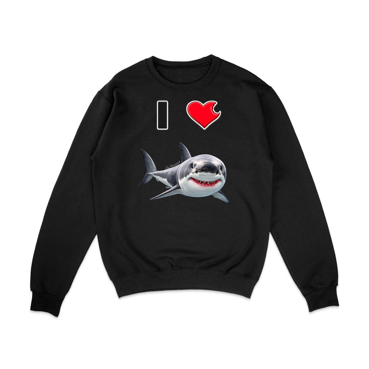 A black crewneck sweatshirt featuring a graphic print of a great white shark and the text 'I' followed by a red heart, displayed on a clean white background.