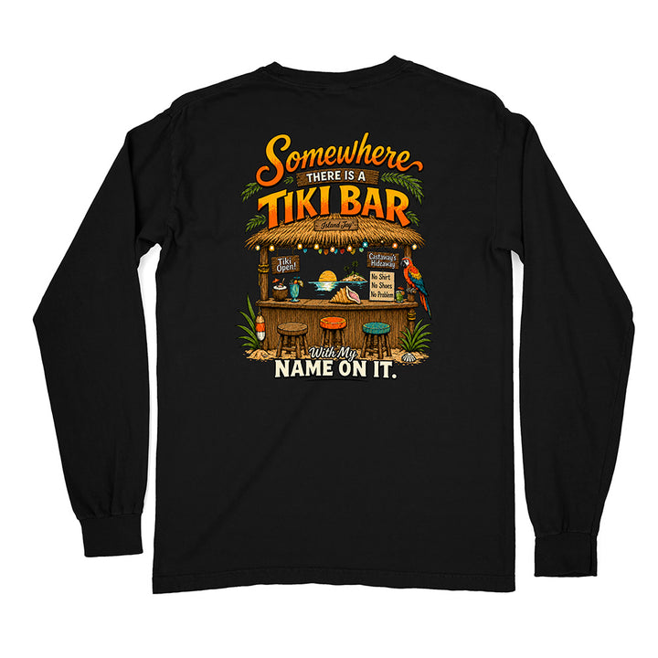 A black long-sleeve t-shirt with a large graphic print on the back featuring a tropical tiki bar scene and the text 'Somewhere THERE IS A TIKI BAR With My NAME ON IT.'.