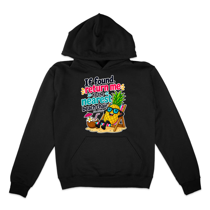 A black pullover hoodie with a colorful graphic on the chest featuring a cartoon pineapple wearing sunglasses and a beach chair next to a cocktail, with the text 'If found return me to the nearest beach bar'.