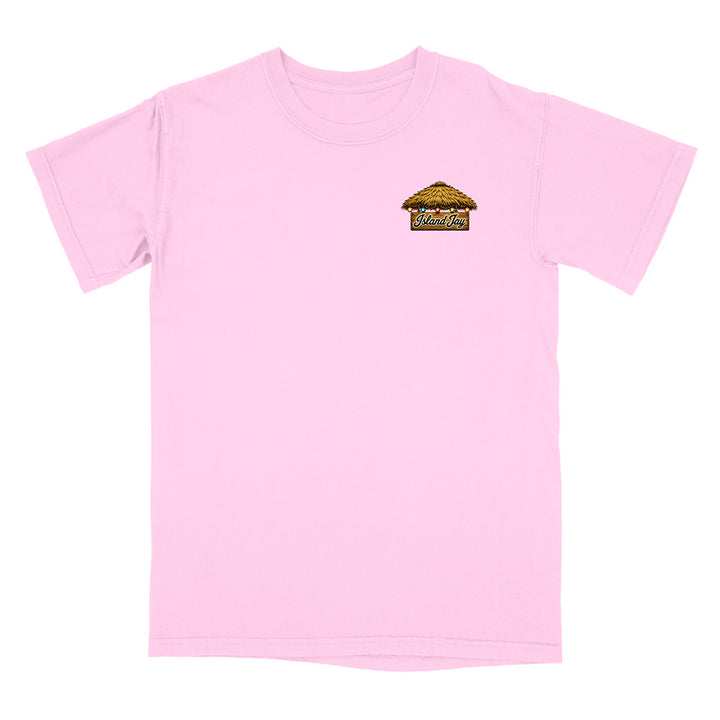 A light pink short-sleeve crewneck t-shirt with a small graphic on the left chest depicting a thatched-roof hut with the text 'WELCOME TO WILMINGTON'.