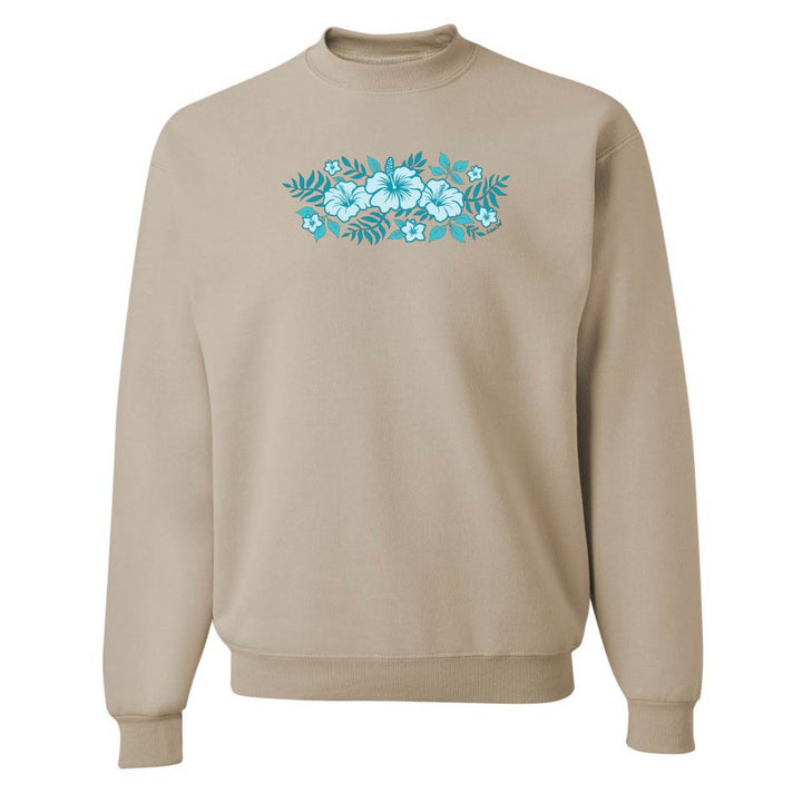 Beige sweatshirt with blue floral design on a white background