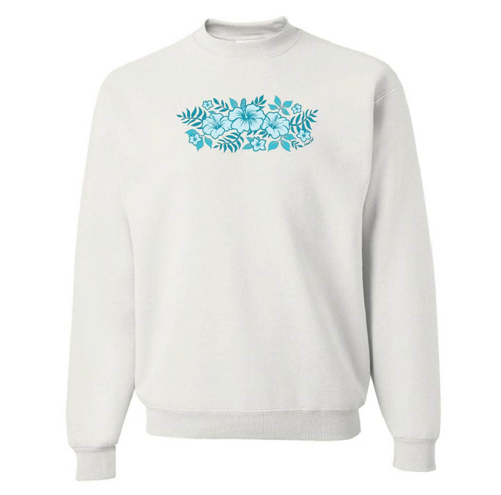 White sweatshirt with blue floral design on a white background