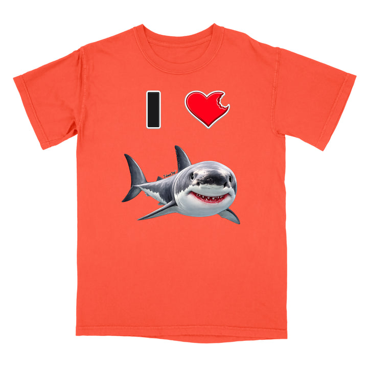A bright orange short-sleeve t-shirt with a graphic on the front that reads 'I' followed by a red heart and a cartoon shark, shown on a plain white background.