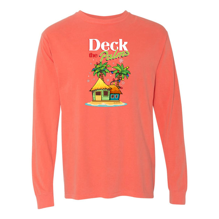 Coral long-sleeve shirt with a tropical hut and palm tree design and graphic text reading "Deck The Palms" on a white background