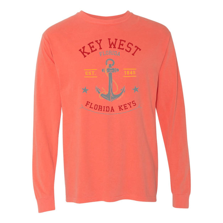 Coral long-sleeve shirt with 'Key West Florida' and anchor graphic on a white background
