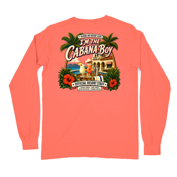 A coral pink long-sleeve t-shirt with a large, colorful graphic on the back. The graphic features palm trees, red hibiscus flowers, a resort building, and cocktails, with text reading 'I'M THE CABANA BOY' and 'OFFICIAL RESORT STAFF'.