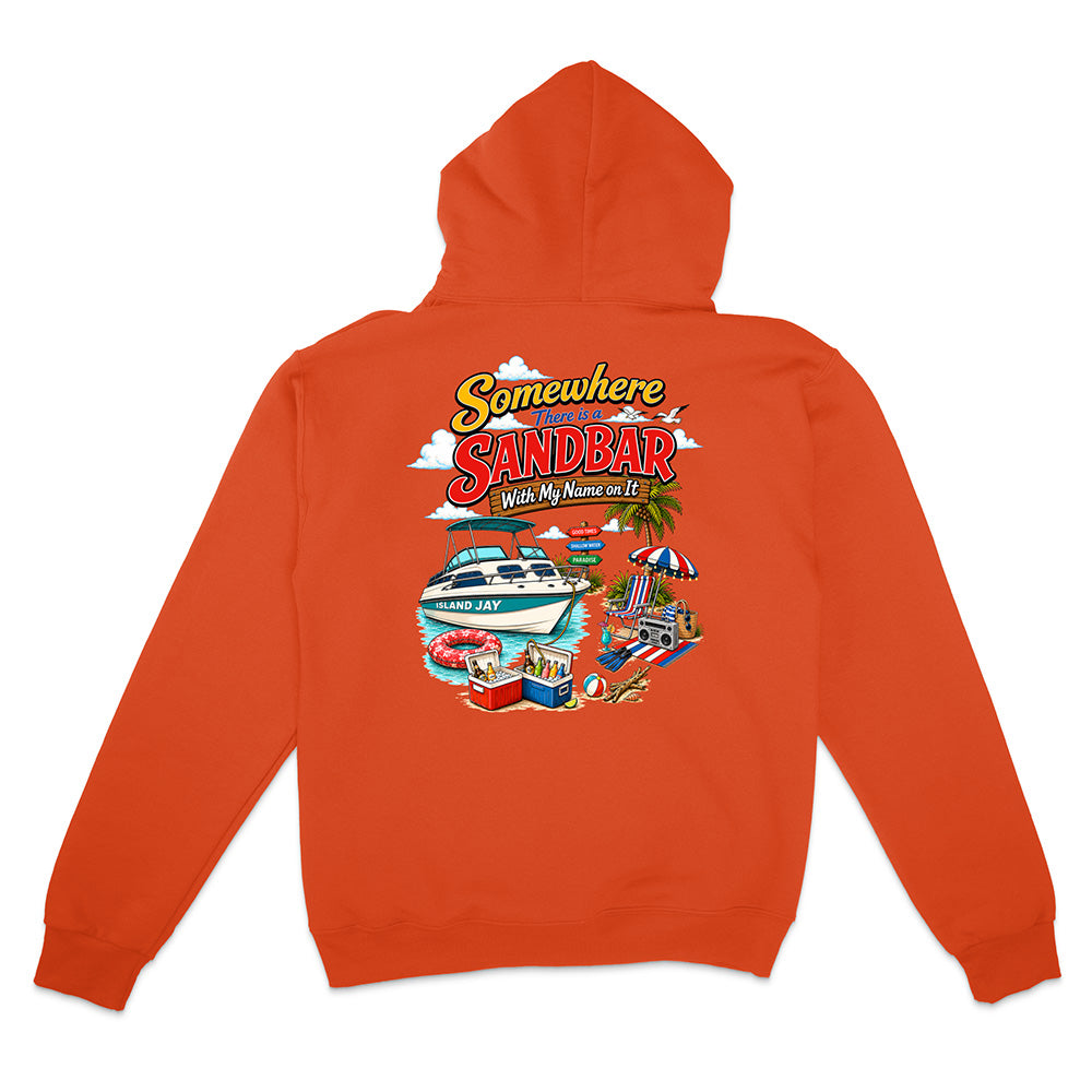 An orange hooded sweatshirt shown from the back, featuring a colorful graphic print with the text 'Somewhere Sandbar' and a beach-themed illustration including a boat, palm tree, beach umbrella, and cooler.