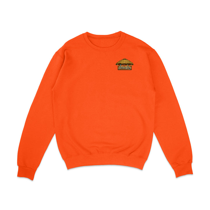 A bright orange crewneck sweatshirt with a small embroidered graphic on the left chest depicting a burger with the text 'Burger Co.'.