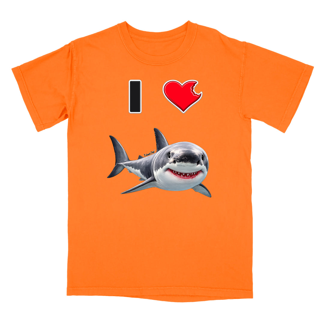 An orange short-sleeve crewneck t-shirt featuring a graphic print of a great white shark and a red heart with a bite taken out of it, alongside a black vertical bar, on a plain white background.