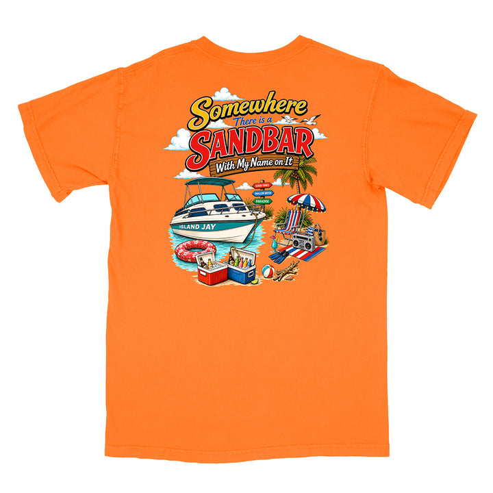 An orange short-sleeve t-shirt with a colorful graphic print on the front featuring a boat, beach umbrella, and the text 'Somewhere There Is A SANDBAR With My Name on It'.