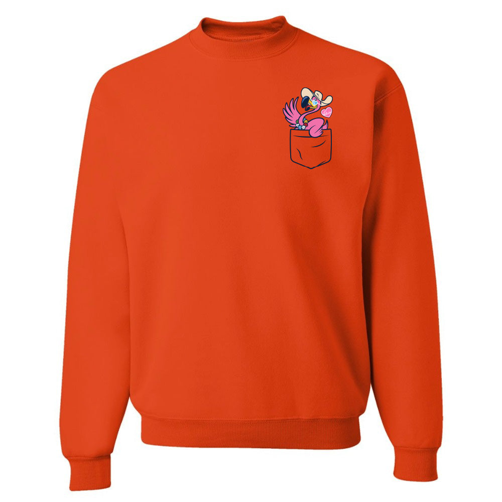Orange sweatshirt with a cartoon character in the pocket on a white background