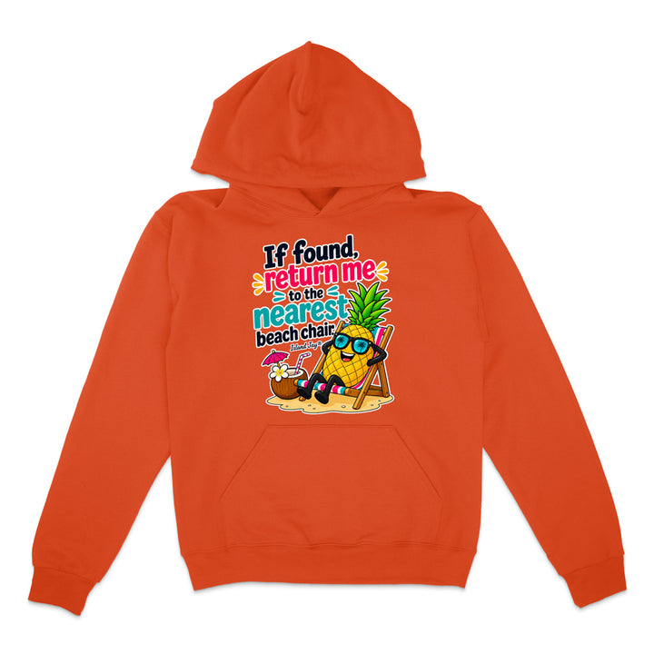 An orange pullover hoodie with a colorful graphic on the chest featuring a pineapple character wearing sunglasses and a beach chair next to a coconut drink, with the text 'If found, return me to the nearest beach chair'.