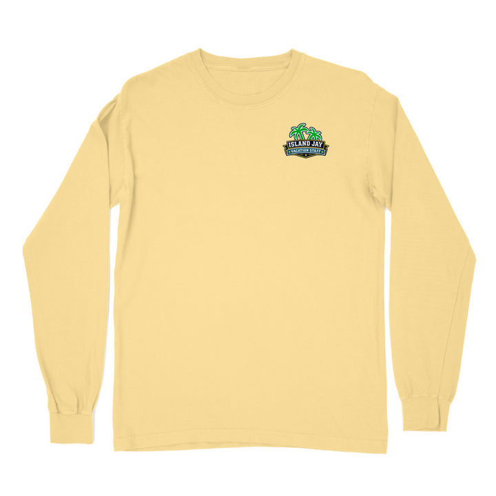 A pale yellow long-sleeve crewneck t-shirt with a small green and blue 'Islands Jet' graphic printed on the left chest, displayed on a solid white background.